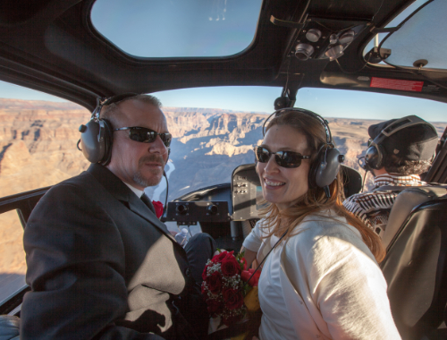 Your Grand Canyon helicopter wedding ceremony begins as you descend below the Rim of this magnificent natural wonder of the World. Exchange vows while flying over the mighty Colorado River!